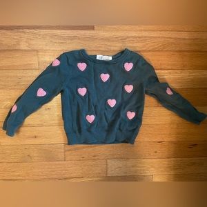 Green and pink toddler sweater